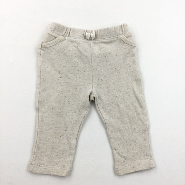 Glittery Oatmeal Joggers With Frills On The Back - Girls 6-9 Months