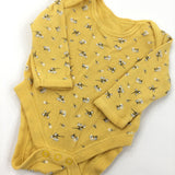 Flowery Yellow Long Sleeve Bodysuit - Girls 0-3 Months