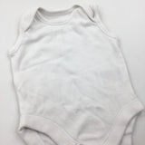White Sleeveless Bodysuit - Boys/Girls Tiny Baby